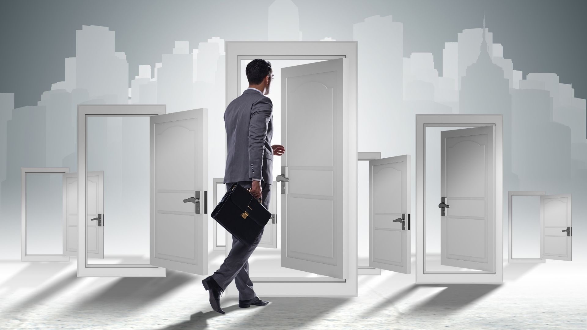 
	Businessman walking through a door, symbolize several opportunities as jobs.
